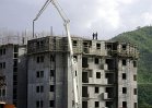 Steel is tied, forms set, and concrete placed repeating the daily cycle