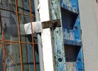 The expanded foam insulation is installed between concrete forms ties prior to setting exterior concrete forms.